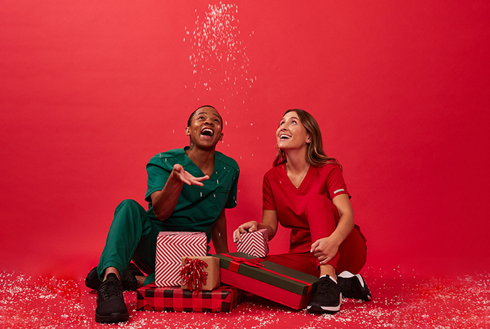 nurses in scrubs with holiday theme