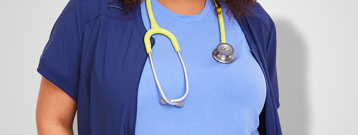 medical professional wearing a yellow stethoscope